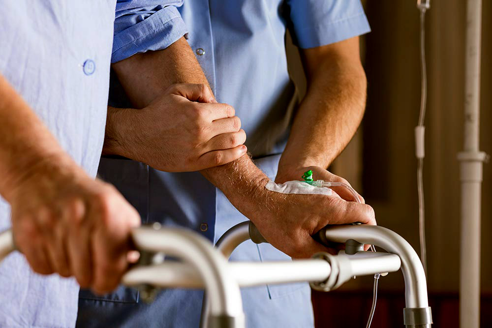 Travel nurse licensure compact walking with patient
