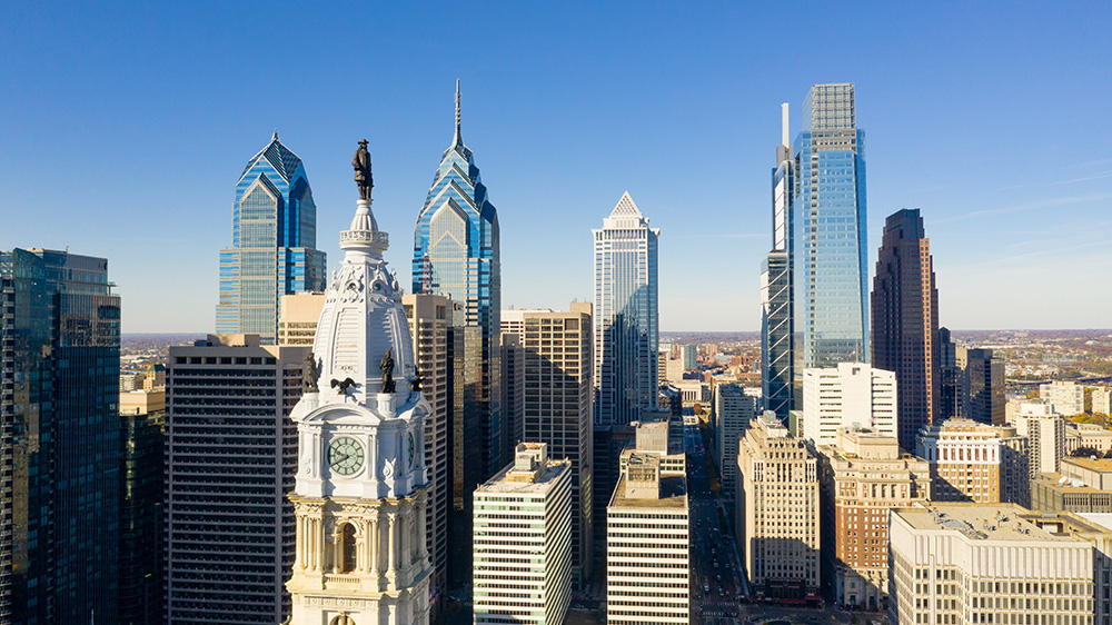 Ben Franklin looks over the city streets of Philadelphia, PA