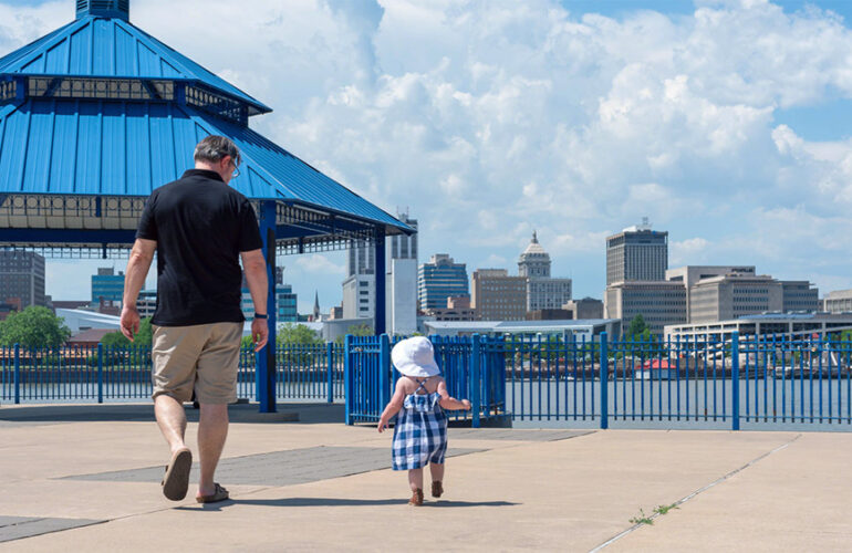 Walking along the Peoria, Ohio riverwalk during the summer offers a relaxing weekend during the summer.