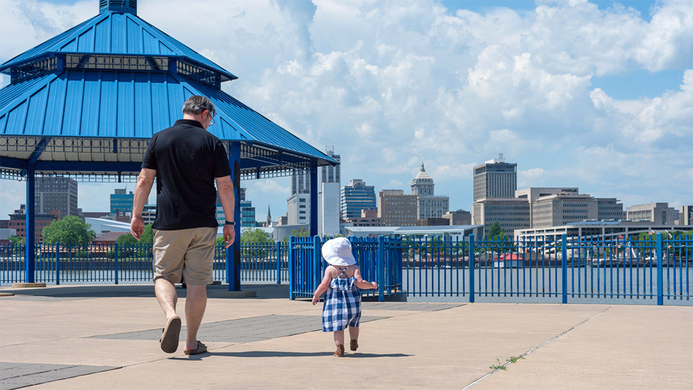 Walking along the Peoria, Ohio riverwalk during the summer offers a relaxing weekend during the summer.