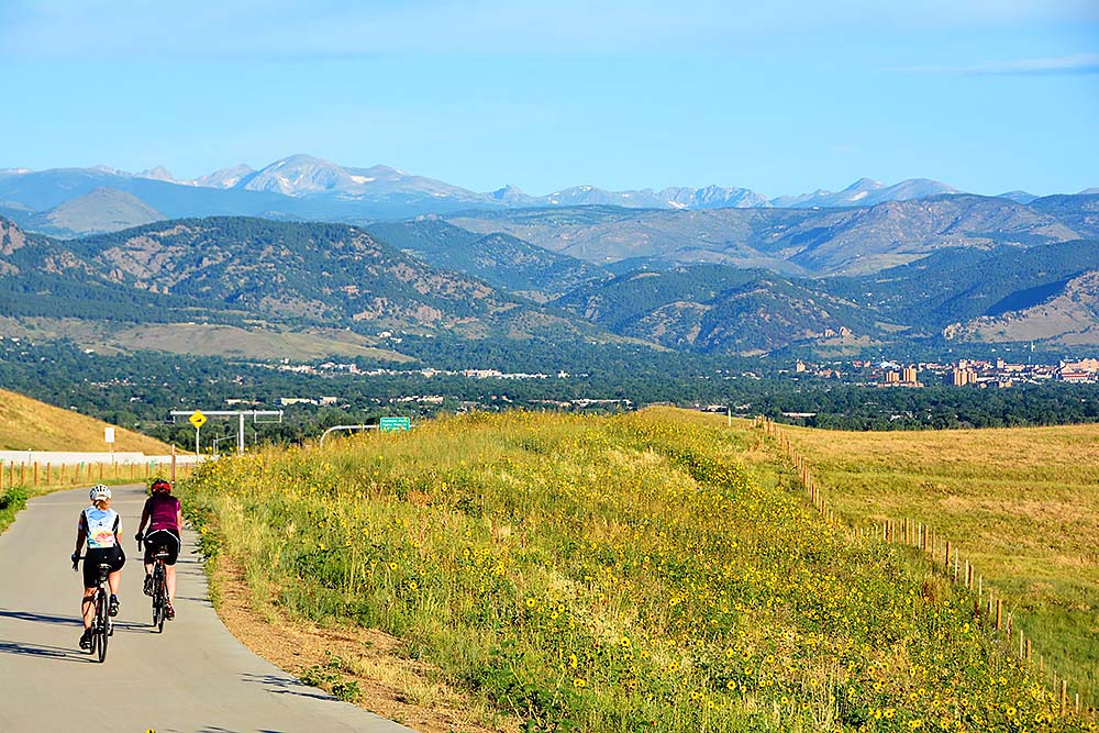 Bicyclists riding towards Boulder Colorado